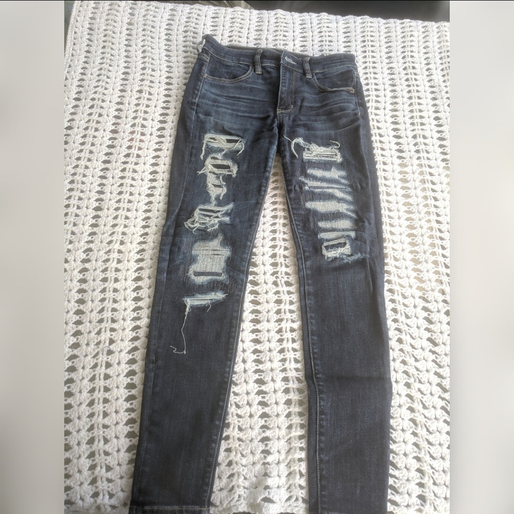 Distressed patched american eagle jeans